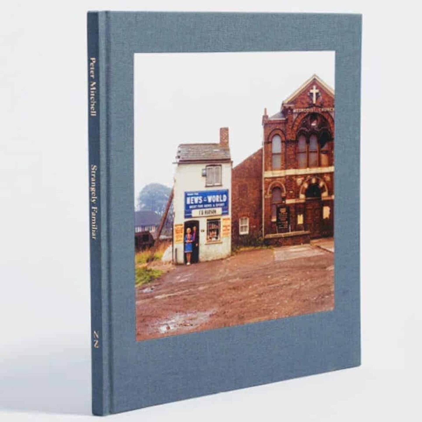 Strangely Familiar | Peter Mitchell (First Edition)