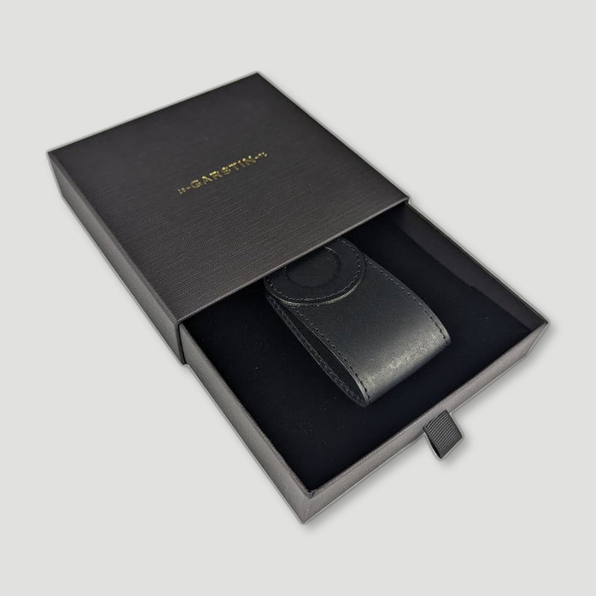 Tag detail of Leather AirTag Key Organiser - Chestnut Brown from Garstin 1871 - British Made Leather Accessories