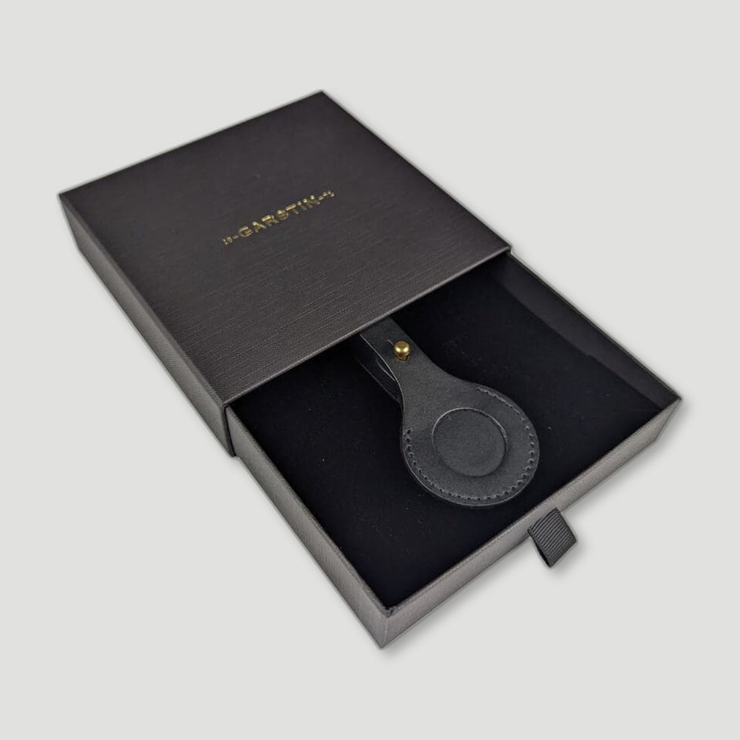 Tag detail of Leather AirTag Luggage Tag - Ebony Black from Garstin 1871 - British Made Leather Accessories