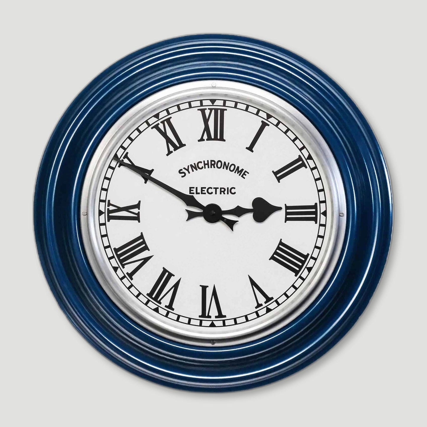 Tag detail of Maria Blue Factory Clock Roman Numerals from Synchronome Clocks - British Made Wall Clocks