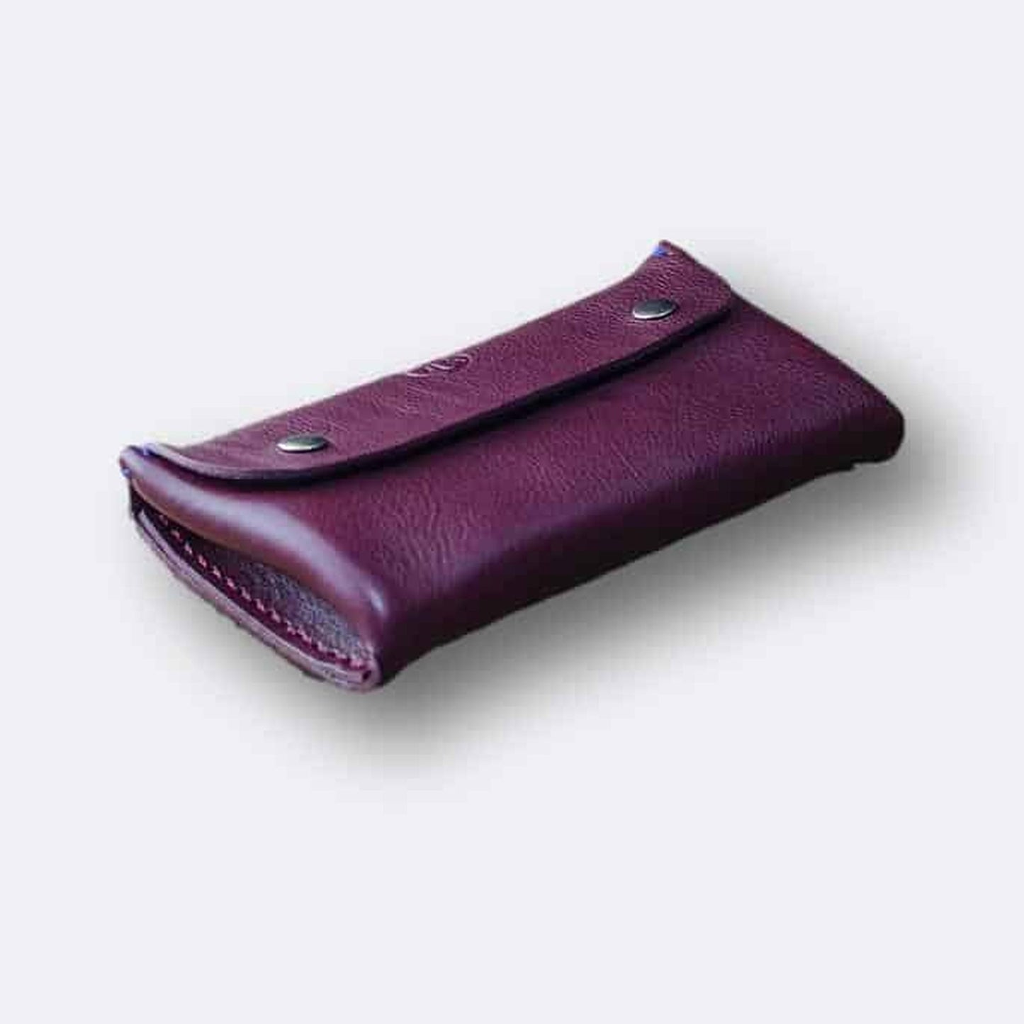 Raisin Leather Purse With Red Waxed Thread