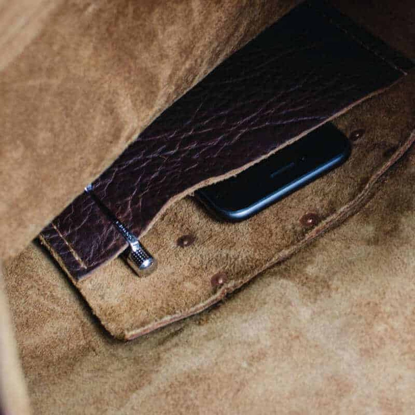 Tan Kodiak Leather Roll Top Backpack