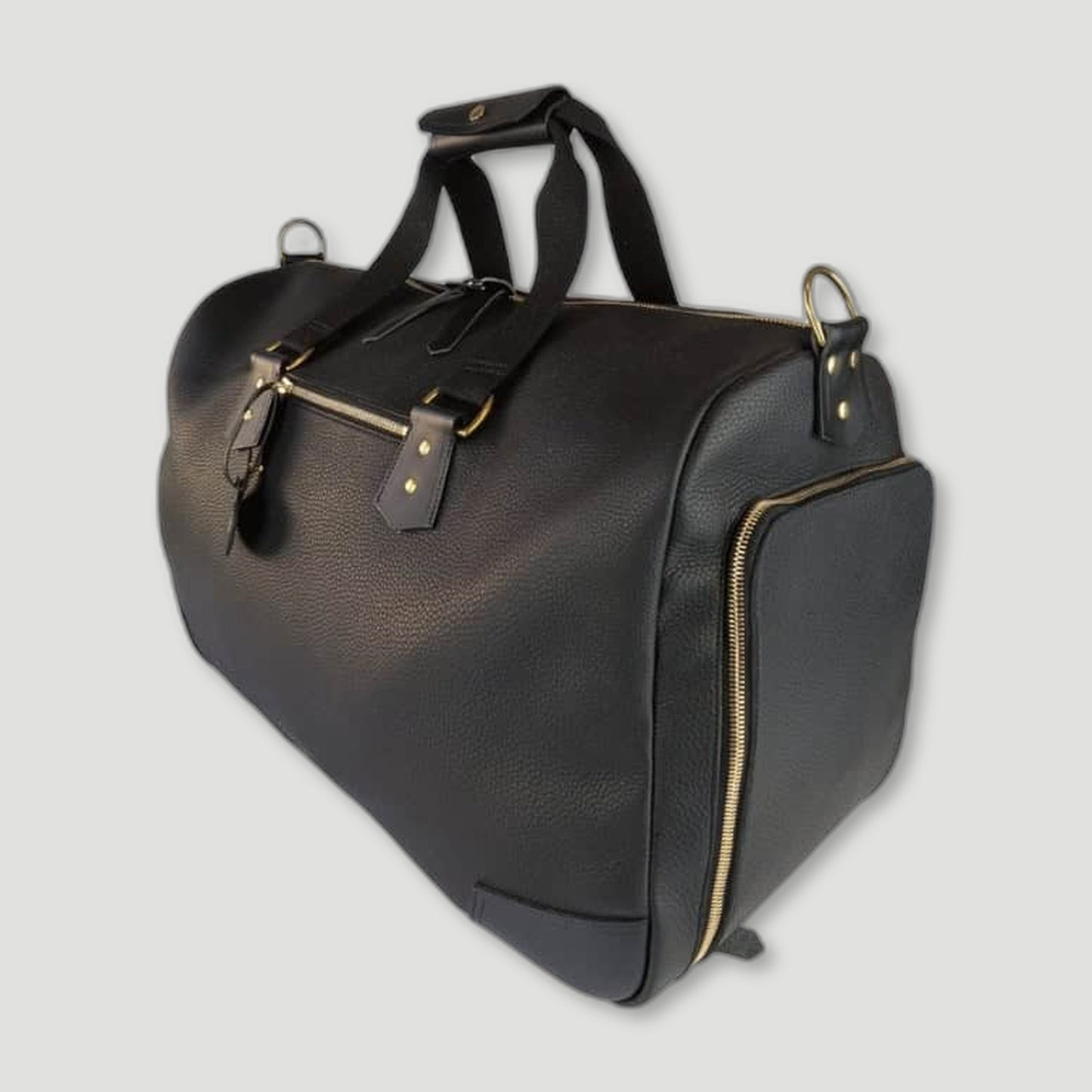 Side view of Ultimate Apple Tech Leather Weekender Bag - Ebony Black from Garstin 1871 - British Made Leather Accessories